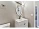 Bathroom featuring a sink with a oval mirror and lighting at 4465 56Th N Ave, St Petersburg, FL 33714