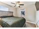 Nicely sized bedroom has plush carpet, ceiling fan and a well organized walk-in closet at 4465 56Th N Ave, St Petersburg, FL 33714