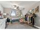 Cozy bedroom featuring ceiling fan and desk area perfect for relaxation or studying at 4465 56Th N Ave, St Petersburg, FL 33714