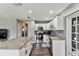 Beautiful kitchen with granite counters, stainless appliances, and white cabinets at 4465 56Th N Ave, St Petersburg, FL 33714