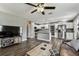 Open floor plan view of the kitchen and living room with wood flooring and grey walls at 4465 56Th N Ave, St Petersburg, FL 33714