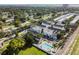 Community view of new townhome construction, featuring community pool and lush landscaping at 4757 Legacy Park Dr, Tampa, FL 33611