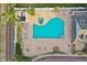 Overhead view of community pool with lounge chairs and mature landscaping at 4757 Legacy Park Dr, Tampa, FL 33611
