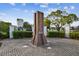 Community entrance with Legacy Park monument, landscaping, and brick paver drive at 4757 Legacy Park Dr, Tampa, FL 33611