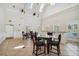 Community lounge features dining tables, comfortable seating, and a bright atmosphere, perfect for gatherings and events at 4757 Legacy Park Dr, Tampa, FL 33611