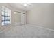 Bright bedroom featuring carpet and a mirrored closet at 5100 Burchette Rd # 3005, Tampa, FL 33647