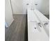 Bathroom featuring a double sink vanity, white countertop, and modern fixtures at 5310 Companion Ln, Tampa, FL 33619
