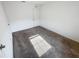 A bedroom with plush carpeting and a window is ready to be filled with furniture at 5310 Companion Ln, Tampa, FL 33619