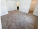 Spacious carpeted bedroom with ensuite bathroom and walk-in closet at 5310 Companion Ln, Tampa, FL 33619