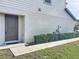 Exterior view of townhome entrance with landscaped pathway at 5310 Companion Ln, Tampa, FL 33619