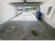Spacious two-car garage with concrete floor and automatic door, providing ample parking and storage space at 5310 Companion Ln, Tampa, FL 33619