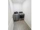 Efficient laundry area showcasing modern washer and dryer units at 5310 Companion Ln, Tampa, FL 33619
