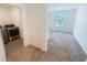 Convenient laundry room featuring modern appliances, ensuring efficient and comfortable living at 5310 Companion Ln, Tampa, FL 33619