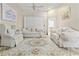 Bright living room with vaulted ceilings, plush furnishings, and a neutral color palette at 6237 Greenwich Dr, Tampa, FL 33647