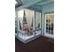 Sun room with tile floors and floor to ceiling windows creates a sun-drenched living space at 625 Fayette S Dr, Safety Harbor, FL 34695