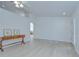 Bright and airy living room featuring hardwood floors and a view of the front door at 7107 Colonial Lake Dr, Riverview, FL 33578