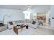 Open-concept living room flows into the kitchen and dining areas, ideal for entertaining and Gathering time at 7107 Colonial Lake Dr, Riverview, FL 33578