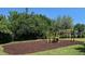 Neighborhood playground with a mulch ground cover at 7107 Colonial Lake Dr, Riverview, FL 33578
