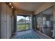 View from balcony of well-maintained grassy area, mature landscaping and pool at 712 Cordova Greens # 712, Largo, FL 33777