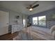 Spacious main bedroom features hardwood floors, walk-out to balcony and large windows at 712 Cordova Greens # 712, Largo, FL 33777