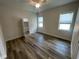 Spacious bedroom with wood floors and plenty of natural light at 7635 N 55Th N St, Pinellas Park, FL 33781