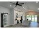 Well-lit kitchen featuring white cabinets, stainless appliances, and a large island at 7635 N 55Th N St, Pinellas Park, FL 33781