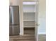 Walk-in pantry providing ample storage space with multiple shelves at 7635 N 55Th N St, Pinellas Park, FL 33781