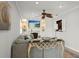 Cozy living room with a fireplace, built-in shelves, comfortable sofa, and stylish decor at 811 Woodley Rd, Clearwater, FL 33764