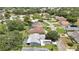 A quiet neighborhood with private pools, tree-lined streets, and well-maintained homes, showcasing community charm at 9346 Southern Belle Dr, Weeki Wachee, FL 34613