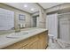 Bathroom with a large vanity, a toilet, and shower at 9346 Southern Belle Dr, Weeki Wachee, FL 34613