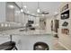 Modern kitchen with granite countertops, stainless steel appliances, and ample cabinet space at 9346 Southern Belle Dr, Weeki Wachee, FL 34613
