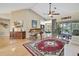 Spacious living room featuring high ceilings, hardwood floors, and natural light at 9346 Southern Belle Dr, Weeki Wachee, FL 34613