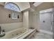 Well-appointed bathroom with soaking tub and separate glass enclosed shower at 9346 Southern Belle Dr, Weeki Wachee, FL 34613