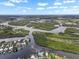 Scenic aerial view of islands, waterways, and neighborhood offering a serene waterside lifestyle at 100 18Th Nw St, Ruskin, FL 33570