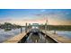 This property features a private boat lift for easy access to the open water for boating and fishing at 100 18Th Nw St, Ruskin, FL 33570