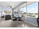 Dining area with lovely water views and an open layout leading into the living room at 100 18Th Nw St, Ruskin, FL 33570