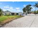 Charming one story home featuring a spacious lot and two car garage at 100 18Th Nw St, Ruskin, FL 33570