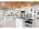 Well-appointed kitchen with a large center island, white cabinetry, and stainless steel appliances at 100 18Th Nw St, Ruskin, FL 33570