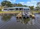 Charming waterfront home with a private boat dock, lift, and peaceful water views at 100 18Th Nw St, Ruskin, FL 33570
