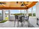 Sunroom with wood-planked ceiling and a waterfront view at 100 18Th Nw St, Ruskin, FL 33570
