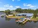Beautiful waterfront home featuring a private boat dock and stunning water views from nearly every room at 100 18Th Nw St, Ruskin, FL 33570
