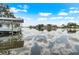 Picturesque waterfront view with boat dock on a clear and sunny day at 100 18Th Nw St, Ruskin, FL 33570