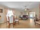 Open living area with dining table and chairs and comfortable seating at 1022 Chandler Snowden Ct, Ruskin, FL 33570