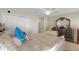 Bright main bedroom with a dresser and mirror for personal storage at 1022 Chandler Snowden Ct, Ruskin, FL 33570
