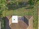 Aerial view of the roof and backyard of a well-maintained single-Gathering home at 12817 Lake Tree Ln, Hudson, FL 34669