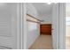 Walk-in closet featuring wire rack shelving, rod for hangers, and extra built-in storage at 12817 Lake Tree Ln, Hudson, FL 34669