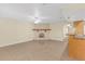 Spacious living room features a fireplace and ample natural light at 12817 Lake Tree Ln, Hudson, FL 34669