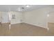 Bright living space with tile floors and arched decorative openings at 12817 Lake Tree Ln, Hudson, FL 34669