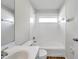 Updated bathroom featuring a shower-tub combo and a modern vanity at 1408 Birchstone Ave, Brandon, FL 33511