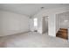 Spacious bedroom with carpet flooring and a view to the bathroom at 1408 Birchstone Ave, Brandon, FL 33511